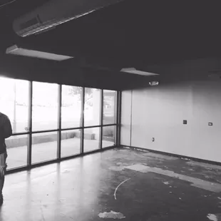 a man standing in an empty room