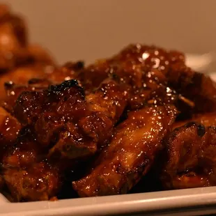 a plate of chicken wings