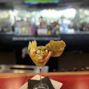 a glass of food on a table