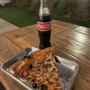 ows a bottle of coke