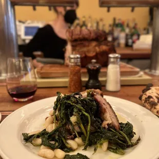 Porchetta with beans and rapini