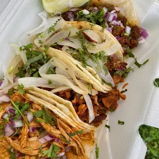 Chorizo, Al Pastor and chicken tinga tacos