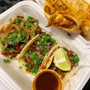 Chorizo and al pastor tacos with a pork quesadilla