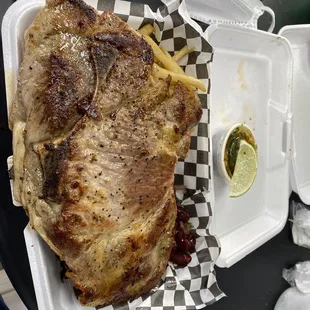 Perfectly grilled Pork Chop with Chimichurri sauce.  Most excellent.