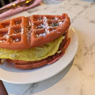 Bacon, egg and cheese on waffle