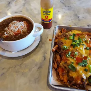 Bowl of gumbo and Debris Fries. Both are off the hook delicious!