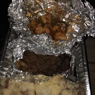Tail off old bay steamed shrimp, 14 oz ribeye premium, garlic red skin mashed hand made by chef Jason