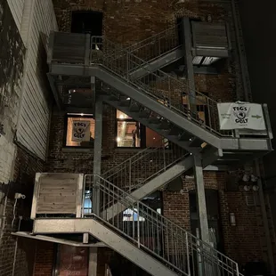 a staircase leading to a bar