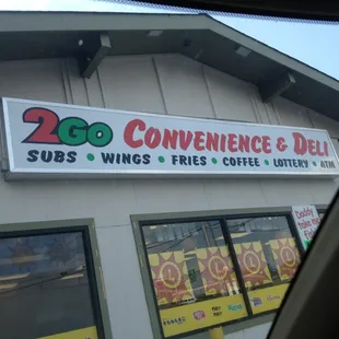 a sign for convenience deli