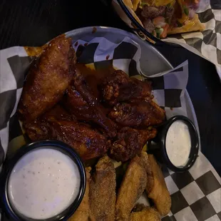 Flaming pepper &amp; Nashville hot wings