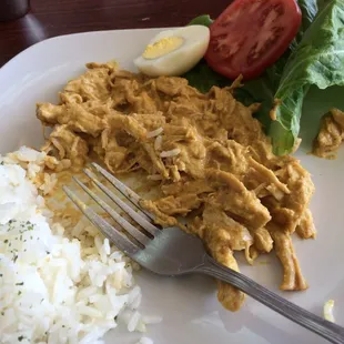 Try the aji de gallina!! And tostones!!