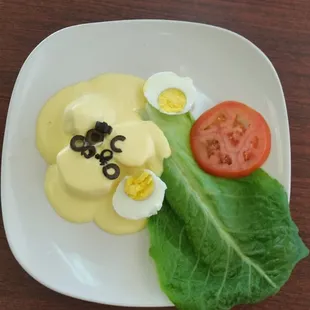 Peruvian papas (potatoes) with cheese sauce and eggs. Unusual and delicious.