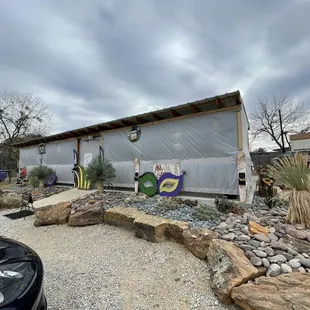 Parking lot looking at enclosed patio.