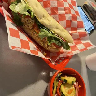 Chicken salad sandwich with cucumber salad. Excellent!