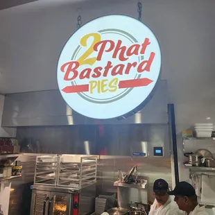 two men working in the kitchen