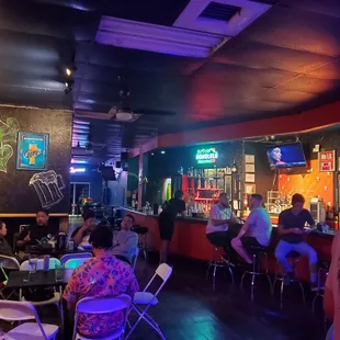 people sitting at a bar