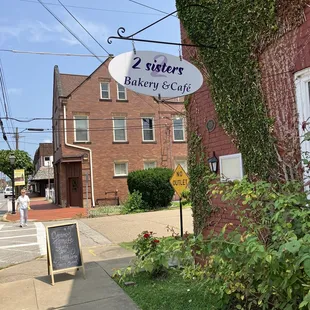 sign for 2 sisters bakery and cafe