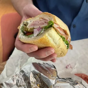 Half of the The Little Italy Sandwich in white bread
