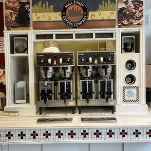 two coffee machines on a counter
