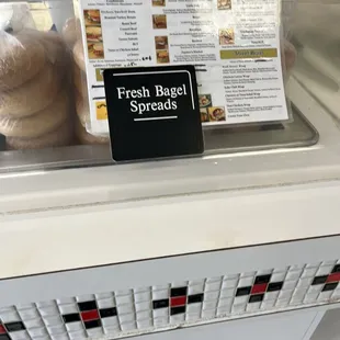 a display of fresh bagel spreads
