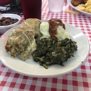 Chicken and Dressing,Turnip Greens, Mashed Potatoes.Speckled butter beans,Pork Chops