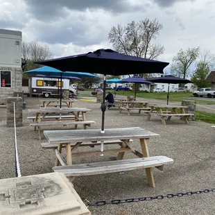 Food trucks and outdoor picnic tables
