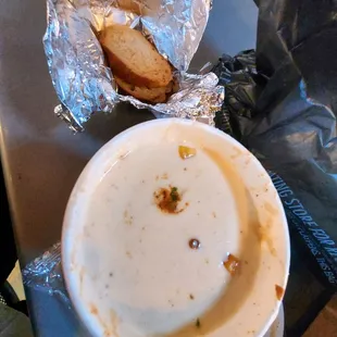 a bowl of soup and a sandwich