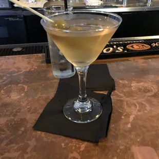 a martini on a table