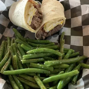 Burger as a wrap with a side of green beans