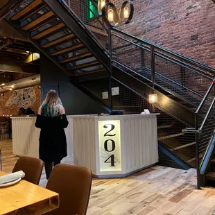 a woman standing at the counter