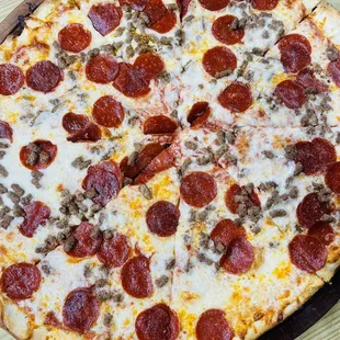 large sausage &amp; pepperoni pizza