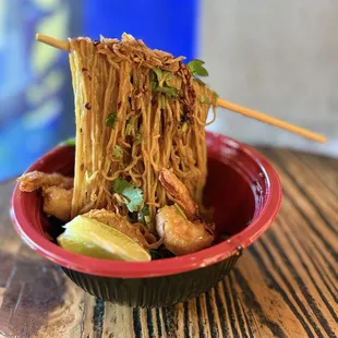 Floating noodles with shrimp and sausage