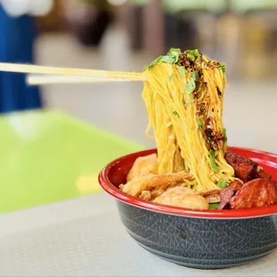 Garlic butter anti-gravity noodles with shrimp, Portuguese sausage and chili oil