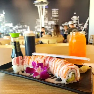 Aloha Roll 
(California Roll with Salmon, Tuna &amp; Crab Meat on top with White Sauce)