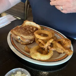 Patty melt with onion rings. The large patty  was freshly made and cooked. Delicious.