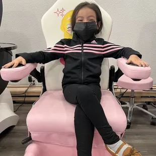 My babygirl in the princess pedicure chair