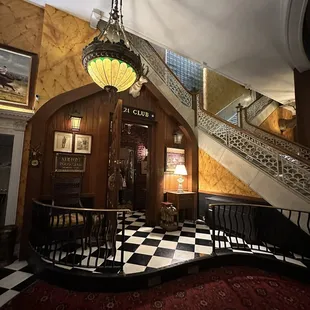 a staircase and a chandelier