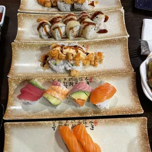 rainbow roll, Salmon Nigiri, Popcorn Lobster Roll, Crunch Roll