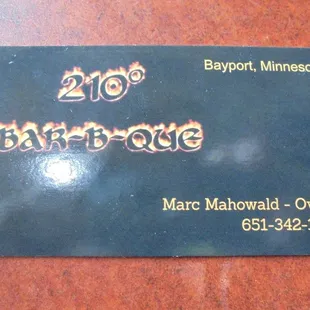 Business card with contact info.