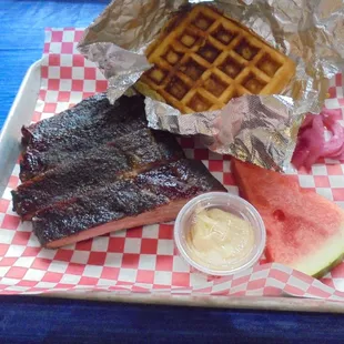 Pork ribs with waffle corn bread.