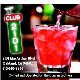 a drink being poured into a glass