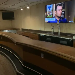 a bar with a flat screen tv