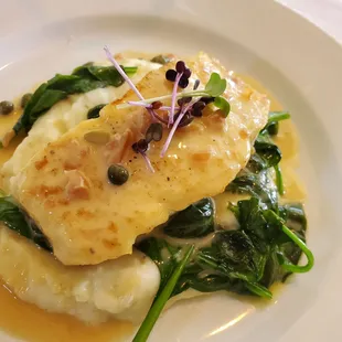 Halibut, whipped potatoes, wilted spinach, beurre blanc and caper sauce. Amazing. Glass of chilled Reisling. Sauce perfect. Delightful.