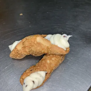 They&apos;re amazing tasting cannolis! Plus they do special requests! Like writing a 31 with pepperonis.