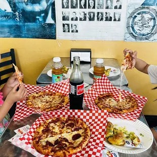 two people eating pizza