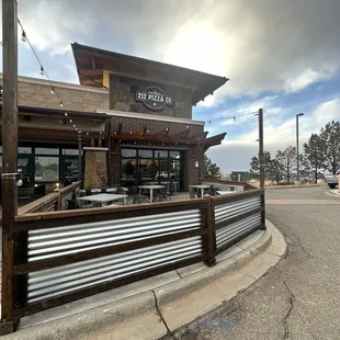Front of 212 Pizza Company and view of their outdoor patio area