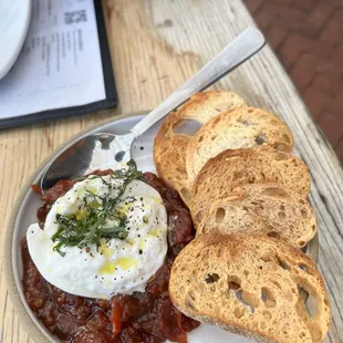Burrata and tomato jam and crostini. They need to bottle up the jam. So , so good!