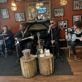 a group of people playing instruments