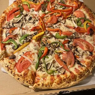 Veggie pizza -large. Veggies seem fresh - they still have a little crunch. better than expected.