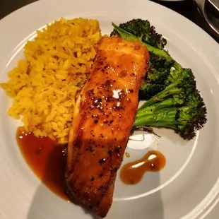 Sweet Soy Salmon with roasted broccoli and yellow rice. Tasty